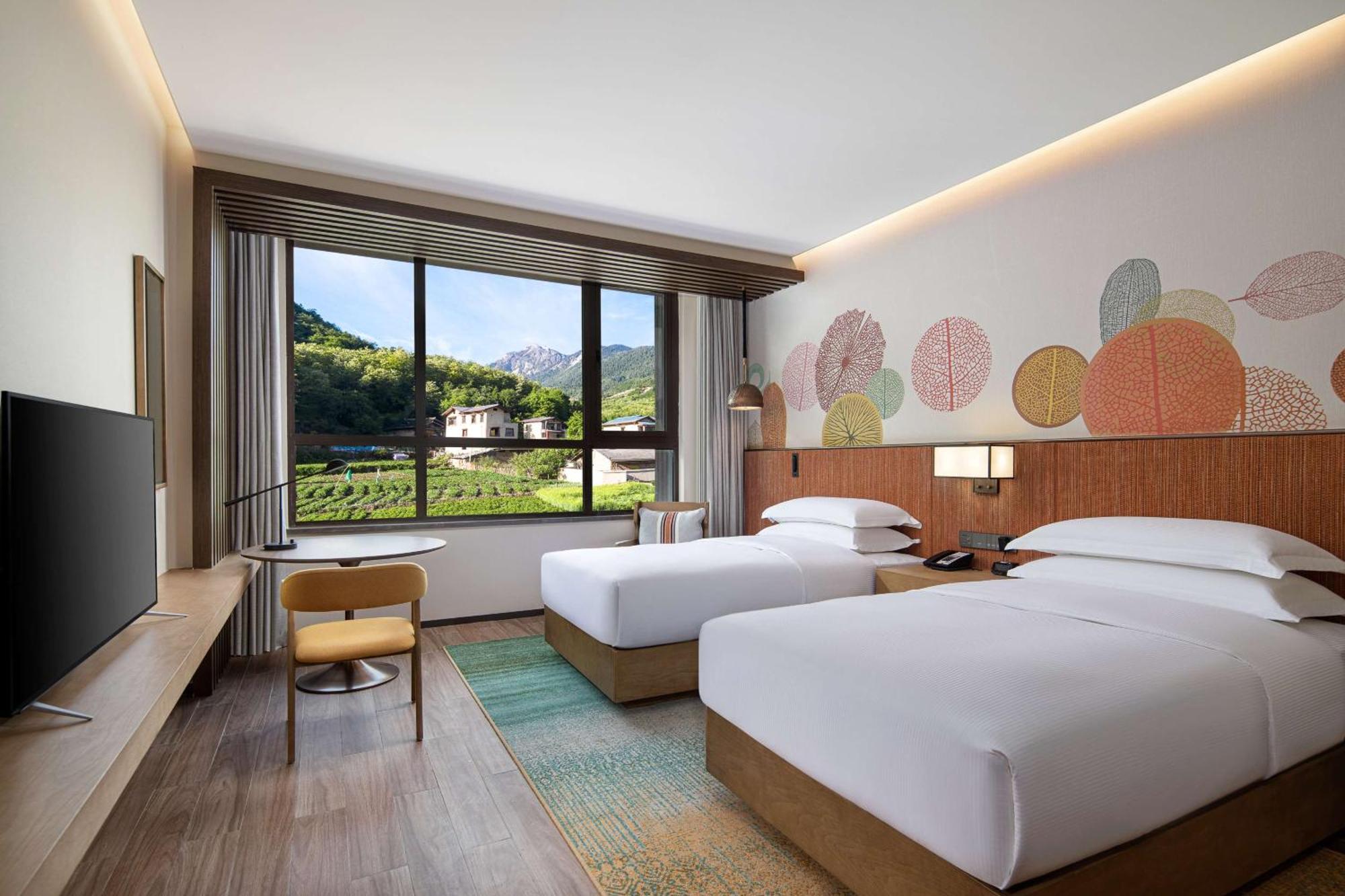 Hilton Garden Inn Jiuzhaigou Bagian luar foto